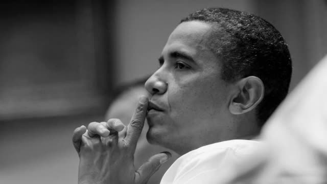 Obama touching face