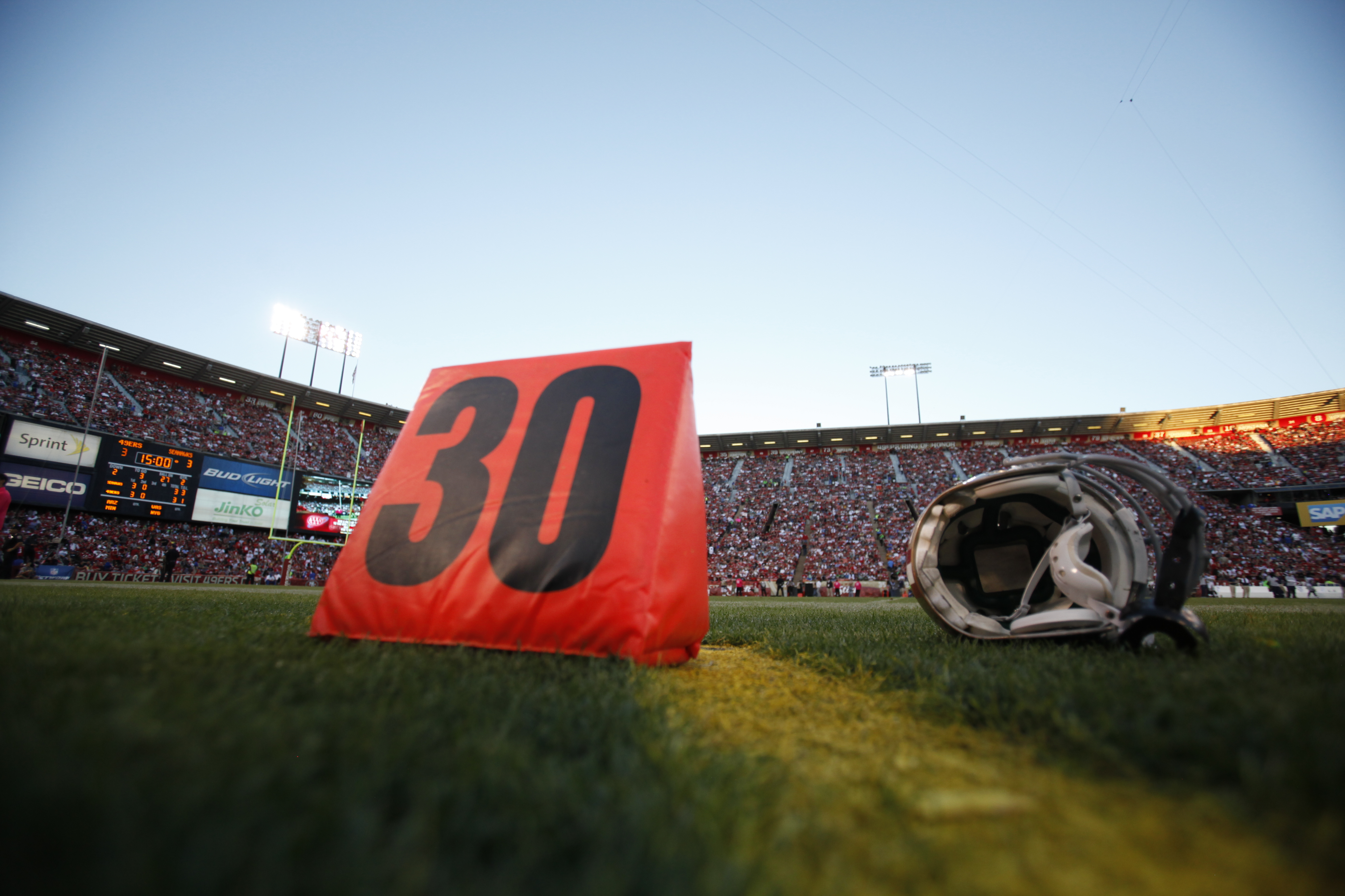 Football helmet on the sideline