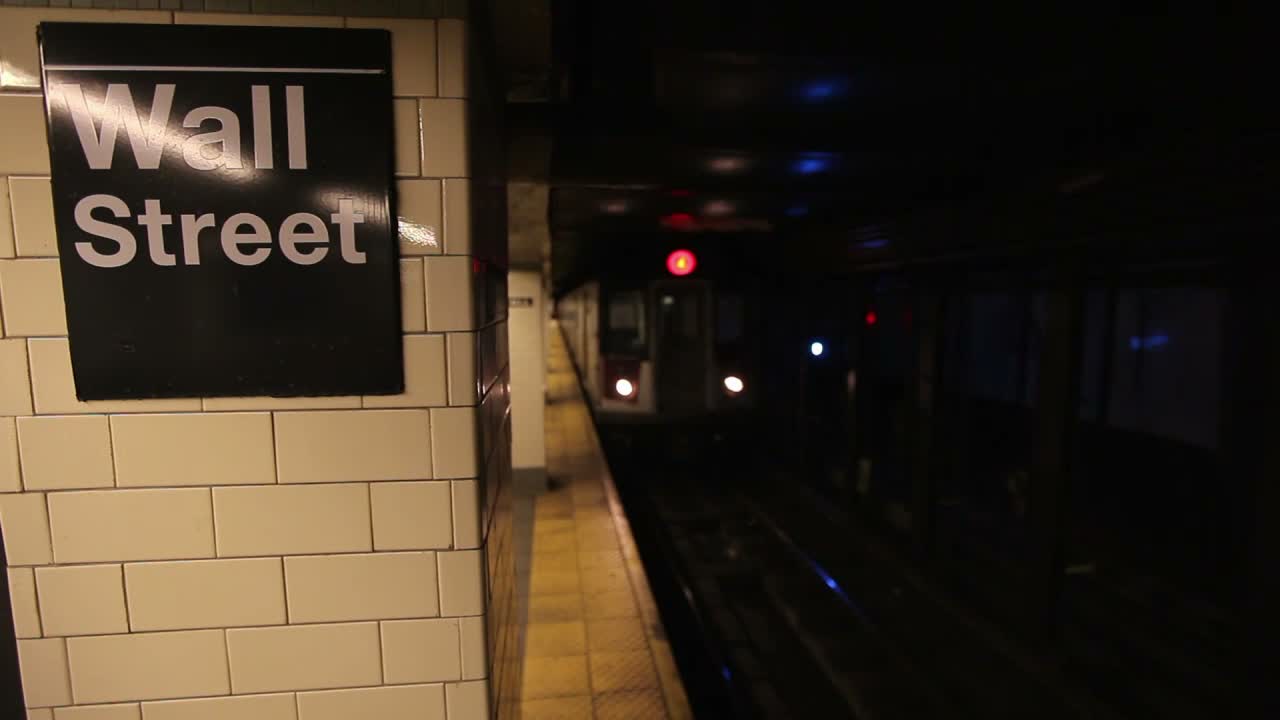 Wall street subway sign