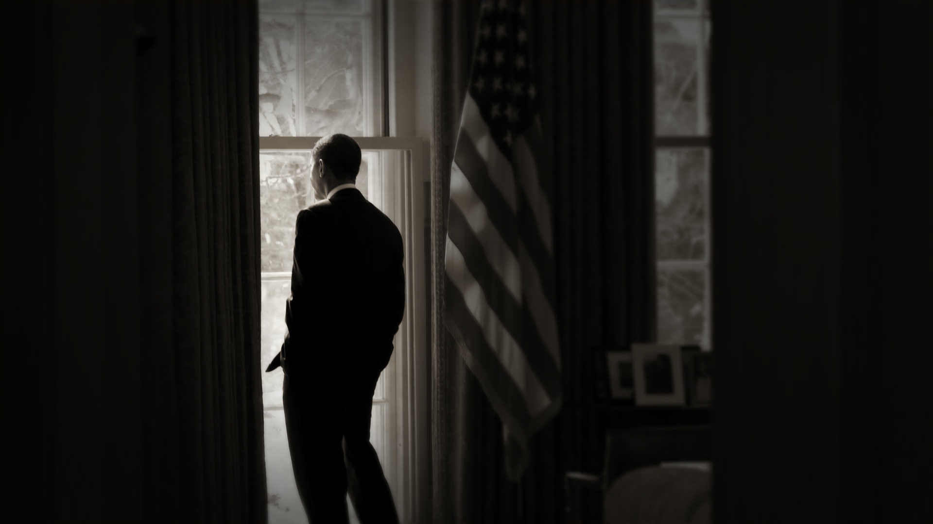 obama looks out window