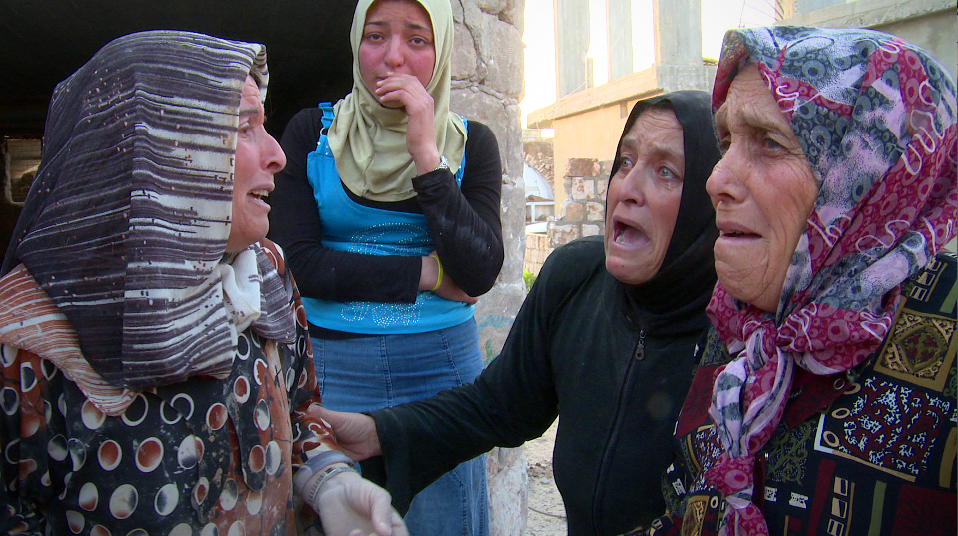Women in grief in al-Bara