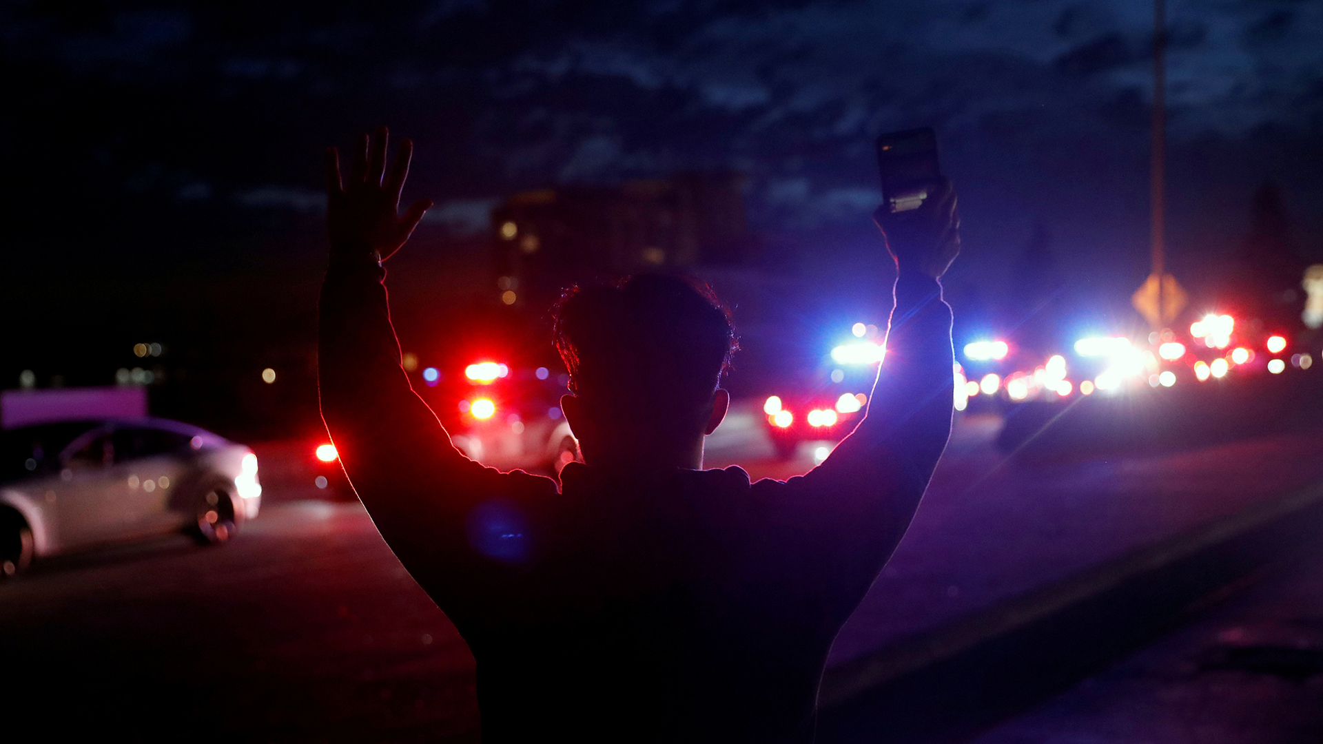 Demonstrators clash with police during a protest in Oakland